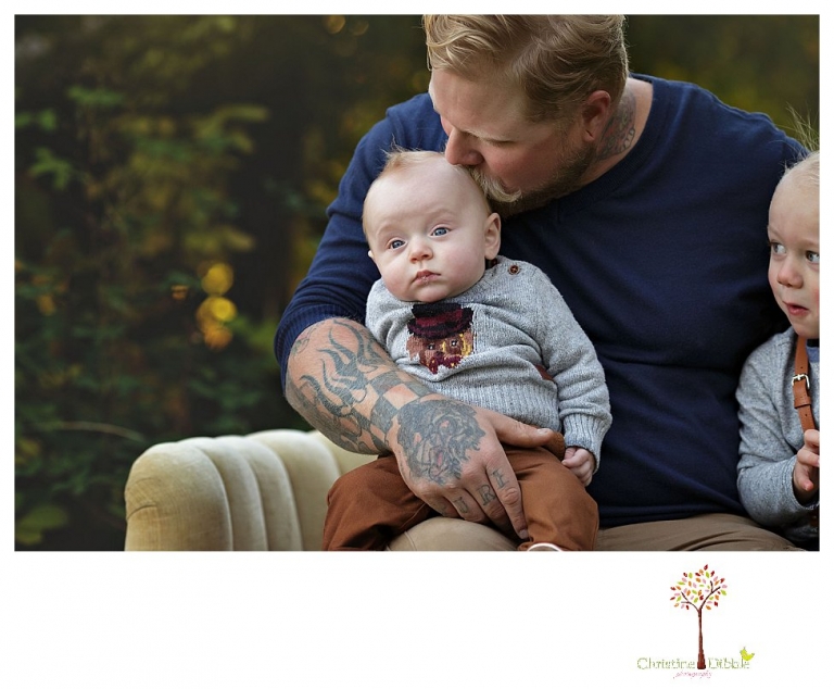 Sonora Family Photographer Christine Dibble Photography takes extended Fall family photos at Indigeny Reserve on a cream velvet loveseat sitting in the apple orchard.