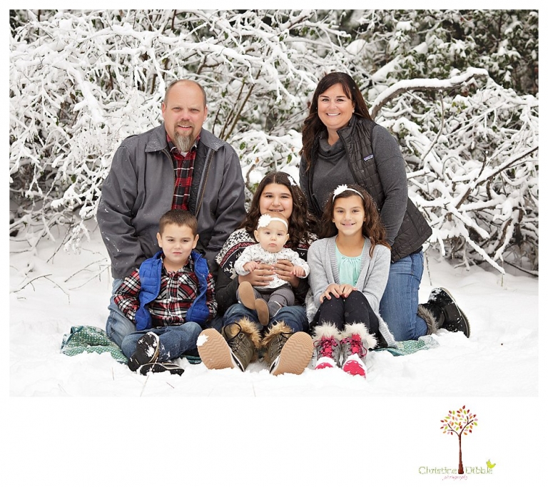 Sonora Family Photographer Christine Dibble Photography takes family portraits in the snow out of Long Barn during a big snowstorm.