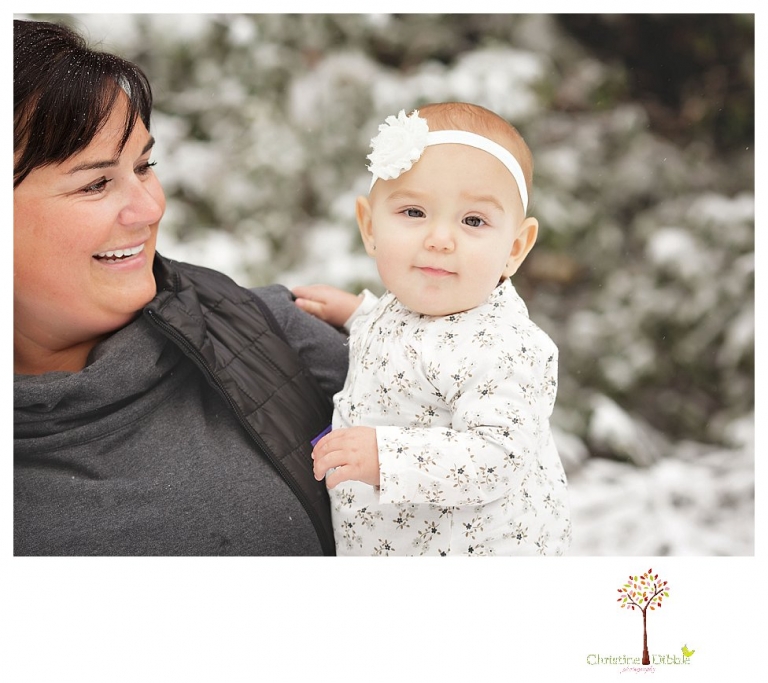 Sonora Family Photographer Christine Dibble Photography takes family portraits in the snow out of Long Barn during a big snowstorm.