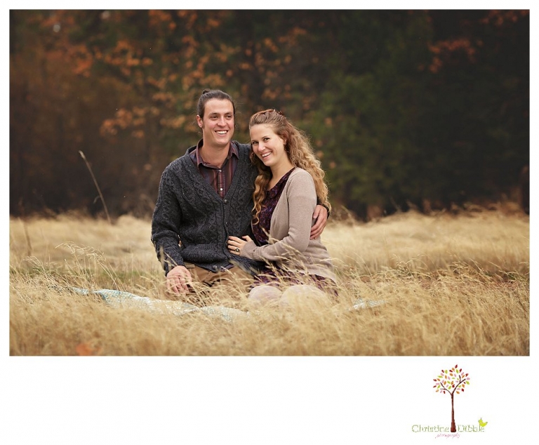 Sonora Family Photographer Christine Dibble Photography takes family portraits of an extended family on Thanksgiving weekend in a field in Twain Harte in snow flurries.