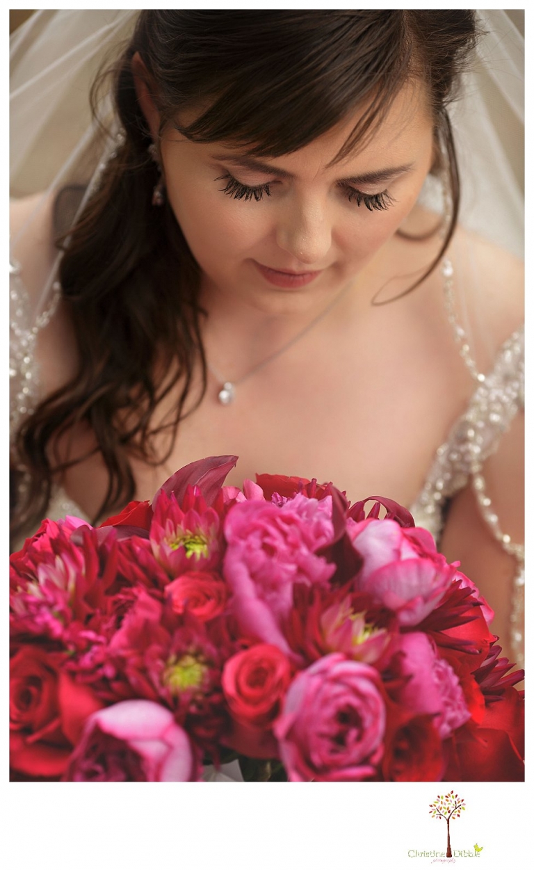 Sonora wedding photographer Christine Dibble Photography photographs a January wedding at the Sonora Opera Hall with bright colors and Nigerian traditions.