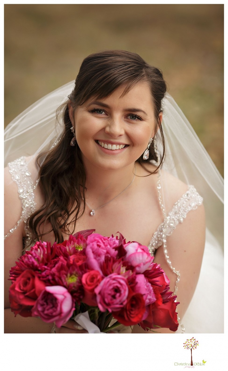 Sonora wedding photographer Christine Dibble Photography photographs a January wedding at the Sonora Opera Hall with bright colors and Nigerian traditions.