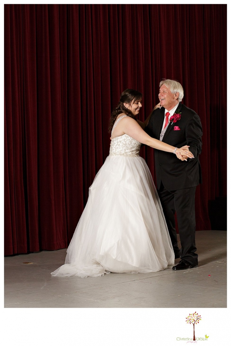 Sonora wedding photographer Christine Dibble Photography photographs a January wedding at the Sonora Opera Hall with bright colors and Nigerian traditions.