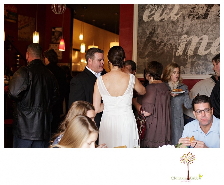 Sonora Wedding Photographer Christine Dibble Photography takes wedding portraits at an outdoor winter rainy wedding at the Tuolumne County Museum courtyard and Emberz restaurant.