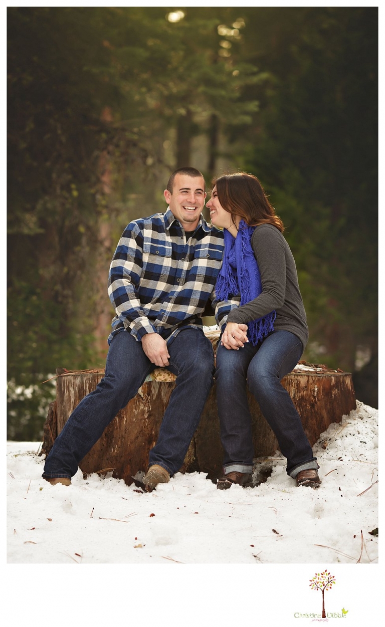 Sonora Engagement Photographer Christine Dibble Photography takes engagement photos in the snow on Valentine's Day at Pinecrest Lake as a couple laughs and throws snowballs for beautiful engagement portraits.