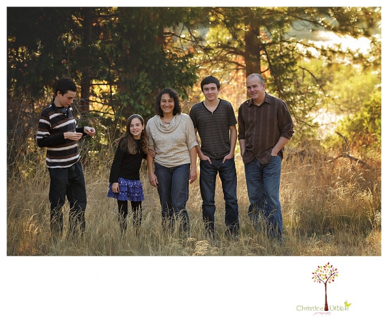 Sonora Family Photographer Christine Dibble Photography takes family portraits in Twain Harte of a family with an autistic child as they pose and play.