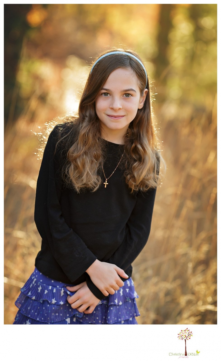 Sonora Family Photographer Christine Dibble Photography takes family portraits in Twain Harte of a family with an autistic child as they pose and play.