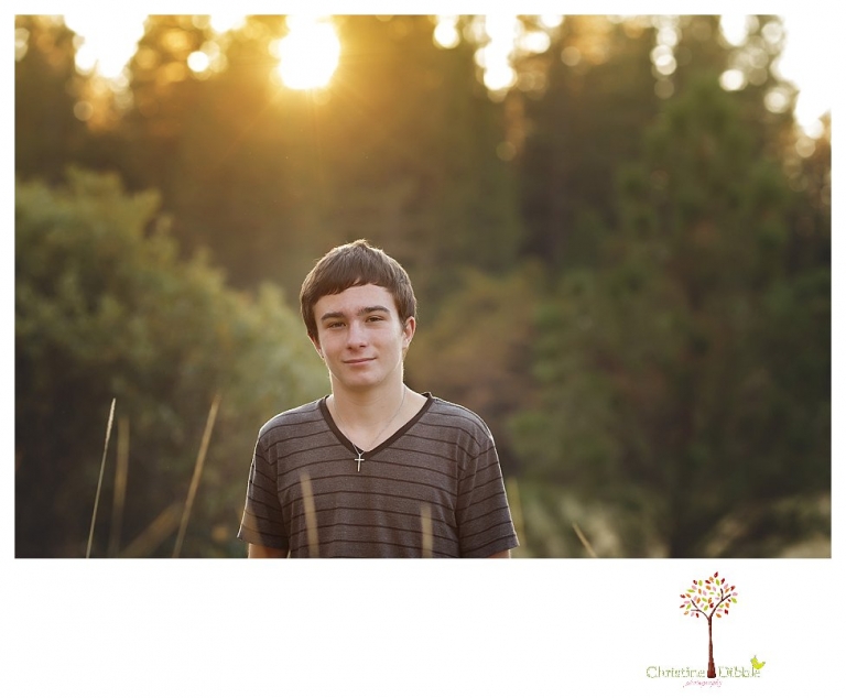 Sonora Family Photographer Christine Dibble Photography takes family portraits in Twain Harte of a family with an autistic child as they pose and play.