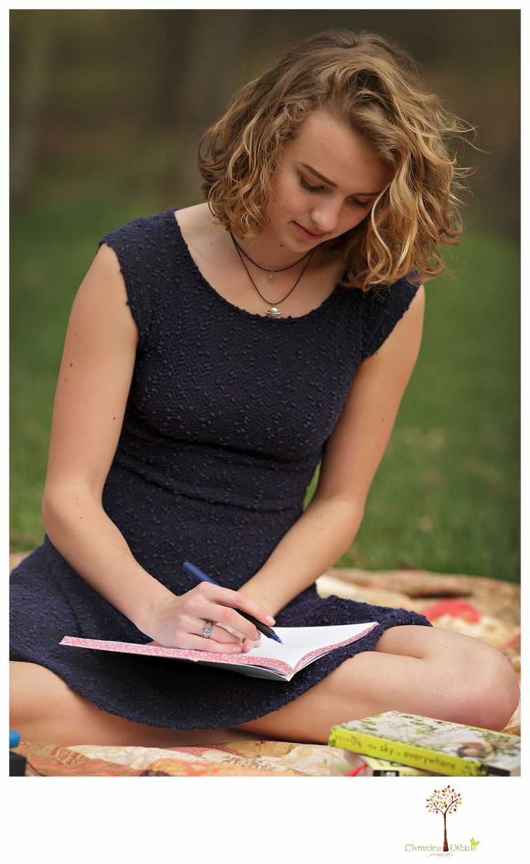 Sonora Senior Portrait photographer Christine Dibble Photography takes outdoor spring senior portraits at Indigeny Reserve of a girl in natural settings and with favorite books.