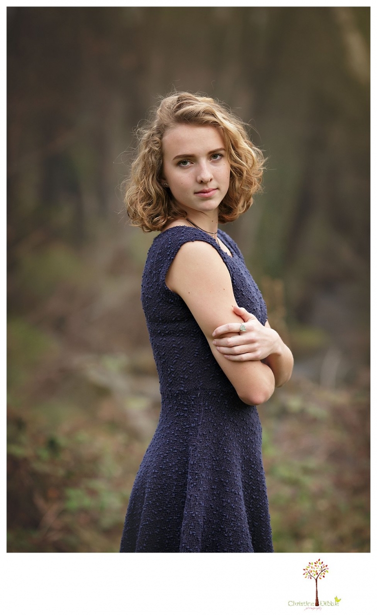 Sonora Senior Portrait photographer Christine Dibble Photography takes outdoor spring senior portraits at Indigeny Reserve of a girl in natural settings and with favorite books.