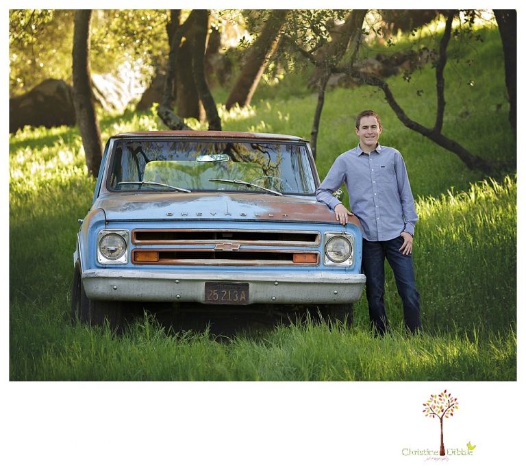 Sonora High senior portrait photographer Christine Dibble Photography takes outdoor spring senior portraits of a track star in his yard with his letterman jacket and old Chevy truck.