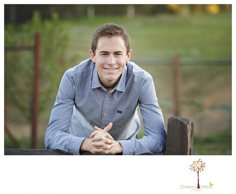 Sonora High senior portrait photographer Christine Dibble Photography takes outdoor spring senior portraits of a track star in his yard with his letterman jacket and old Chevy truck.