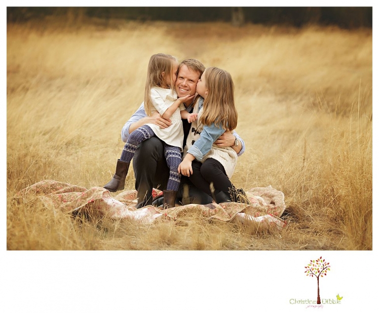 Sonora Family Photographer Christine Dibble Photography takes fall family portraits of a family with two little girls in both formal poses and while they hunt for ladybugs.