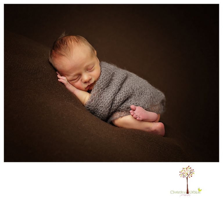 Newborn photography by Sonora Newborn Photographer Christine Dibble Photography takes place in her Sonora studio with poses on blankets and in vintage props.
