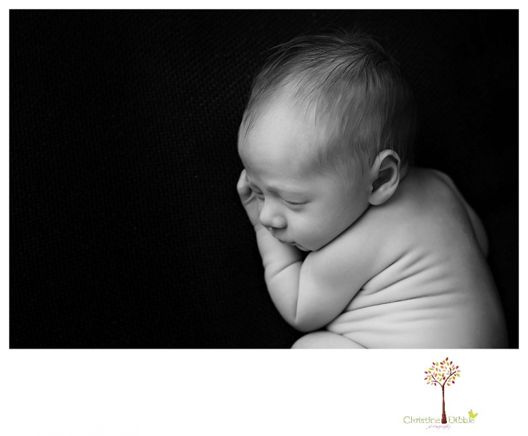 Newborn photography by Sonora Newborn Photographer Christine Dibble Photography takes place in her Sonora studio with poses on blankets and in vintage props.