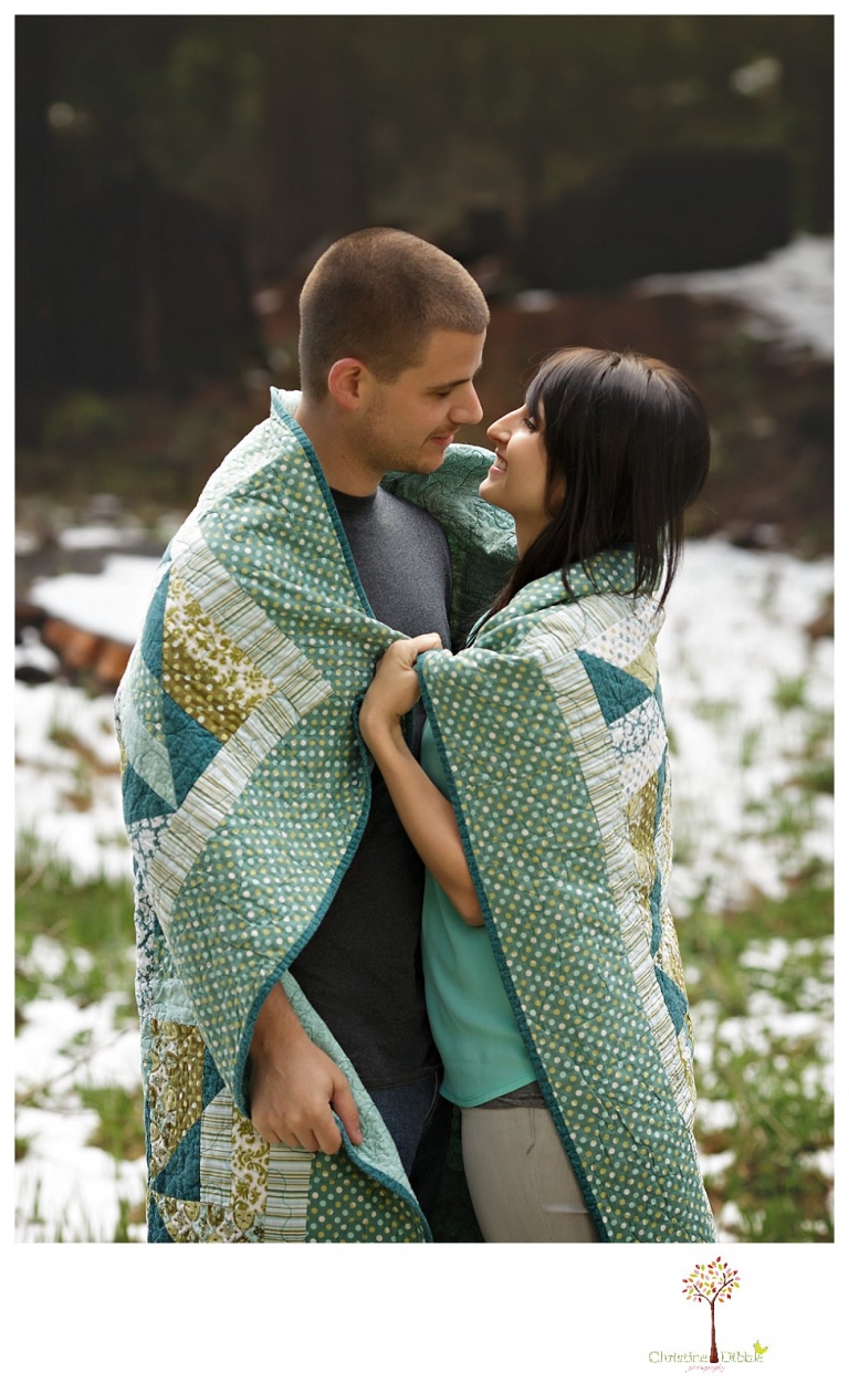 Sonora engagement and wedding photographer Christine Dibble Photography takes engagement photos of a couple in the woods at Pinecrest as they dance on a stump and walk through the trails. 