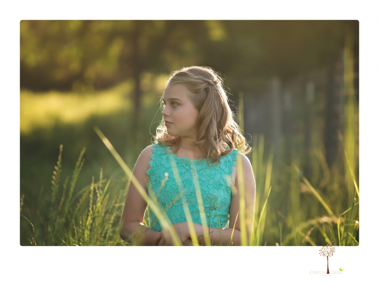 Sonora graduation photographer Christine Dibble Photography takes eighth grade graduation portraits of a girl in her dress and softball uniform before she heads off to Sonora High School.