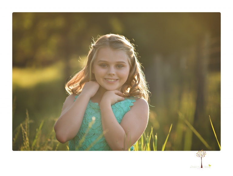 Sonora graduation photographer Christine Dibble Photography takes eighth grade graduation portraits of a girl in her dress and softball uniform before she heads off to Sonora High School.