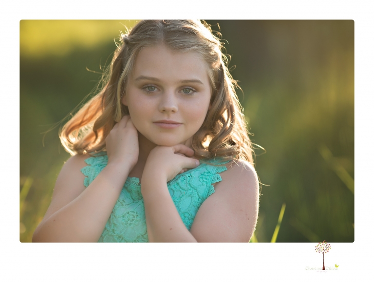 Sonora graduation photographer Christine Dibble Photography takes eighth grade graduation portraits of a girl in her dress and softball uniform before she heads off to Sonora High School.