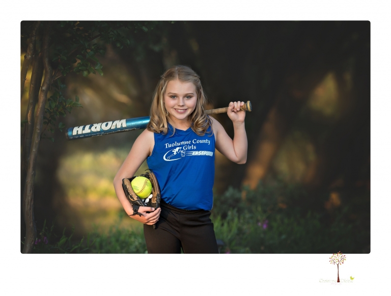 Sonora graduation photographer Christine Dibble Photography takes eighth grade graduation portraits of a girl in her dress and softball uniform before she heads off to Sonora High School.