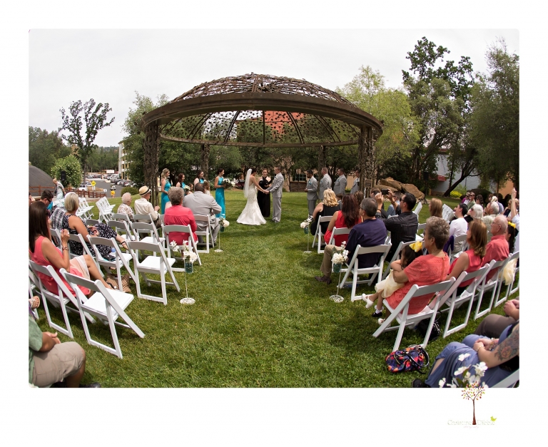 Sonora Wedding Photographer Christine Dibble Photography takes wedding photos at a Black Oak Casino Resort wedding including the ceremony under the iron gazebo.