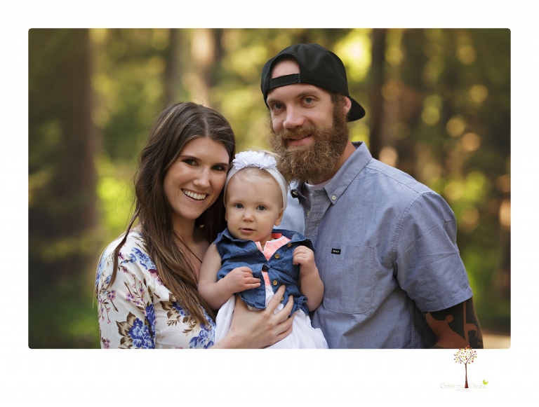 Sonora and Grass Valley family photographer Christine Dibble Photography takes first birthday cake smash photos of a baby girl and her family.  