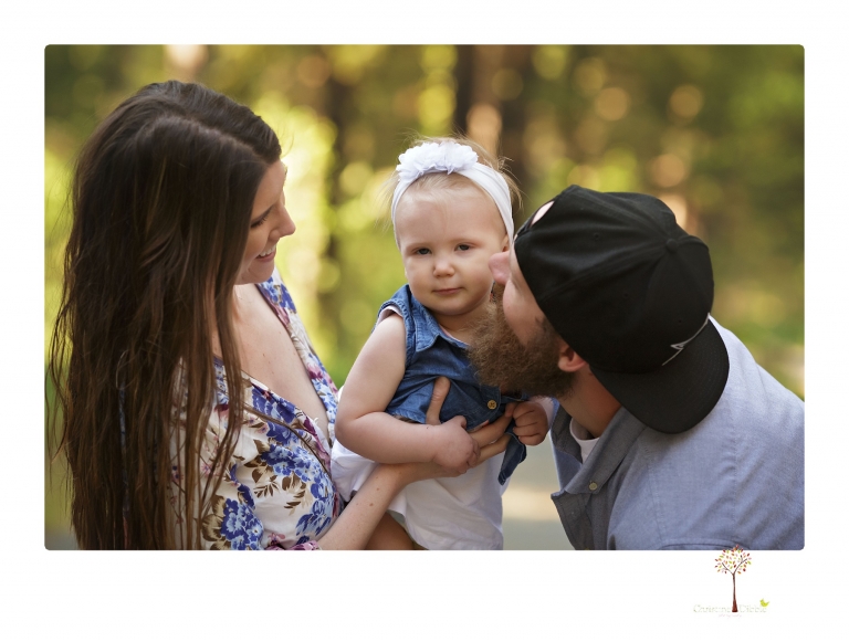 Sonora and Grass Valley family photographer Christine Dibble Photography takes first birthday cake smash photos of a baby girl and her family.  