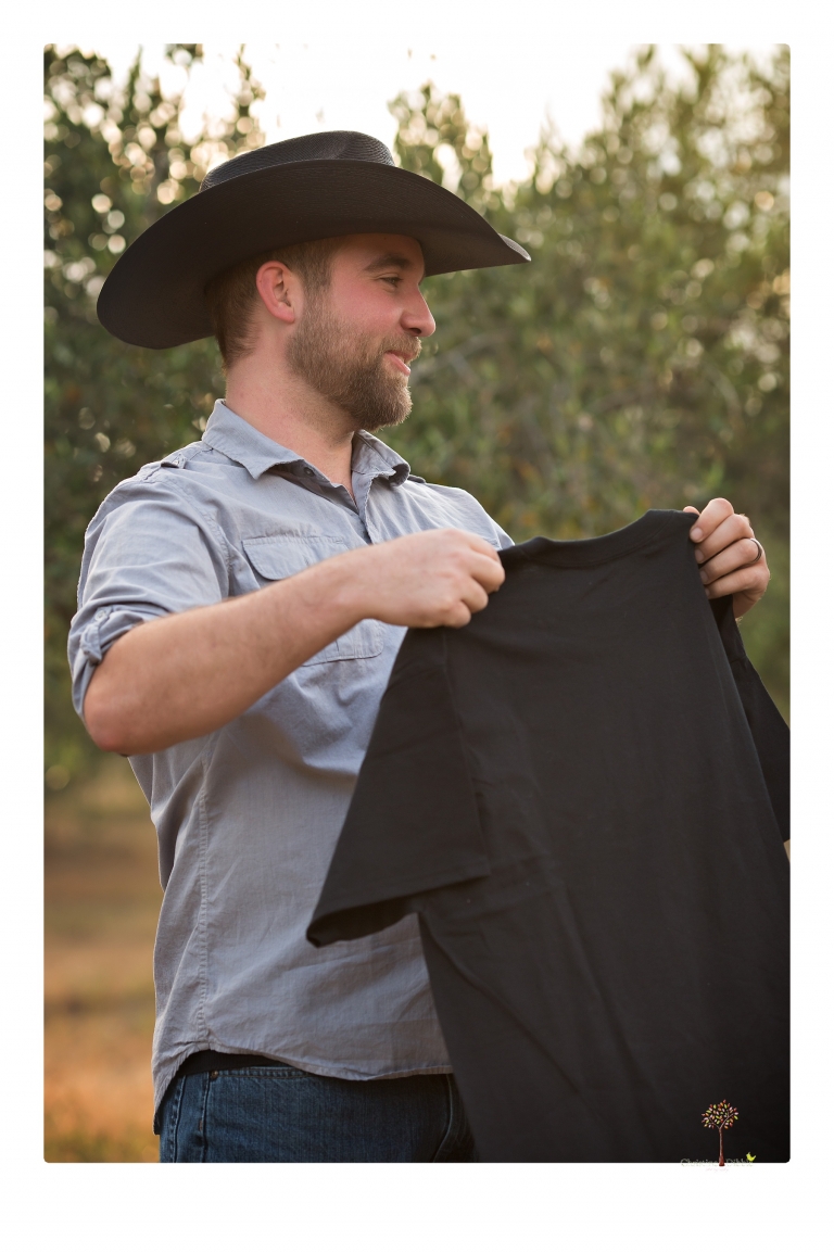 Sonora family photographer Christine Dibble Photography photographs a pregnancy announcement at Hurst Ranch as a wife tells her husband she is pregnant with baby number three during a family portrait session.