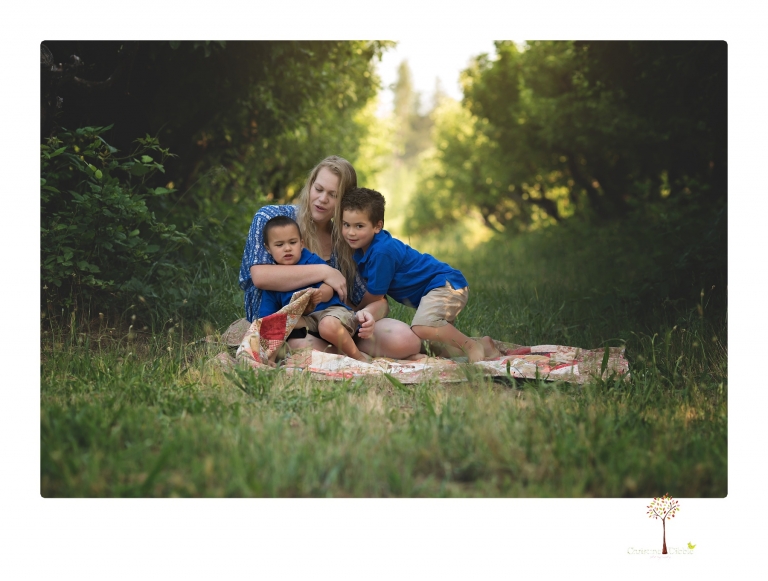 Sonora family photographer Christine Dibble Photography takes photos of a mom and her boys as they wander around Indigeny Reserve.