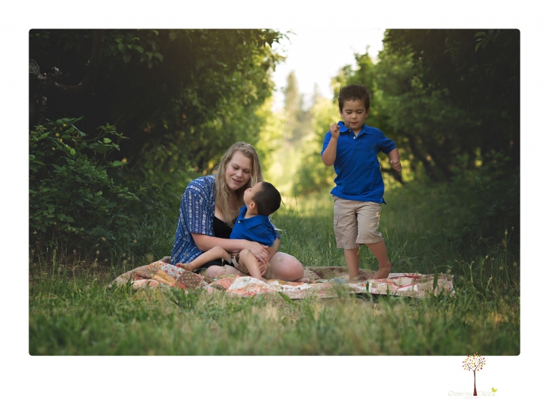 Sonora family photographer Christine Dibble Photography takes photos of a mom and her boys as they wander around Indigeny Reserve.