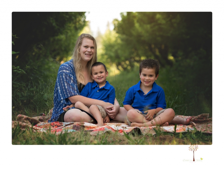 Sonora family photographer Christine Dibble Photography takes photos of a mom and her boys as they wander around Indigeny Reserve.
