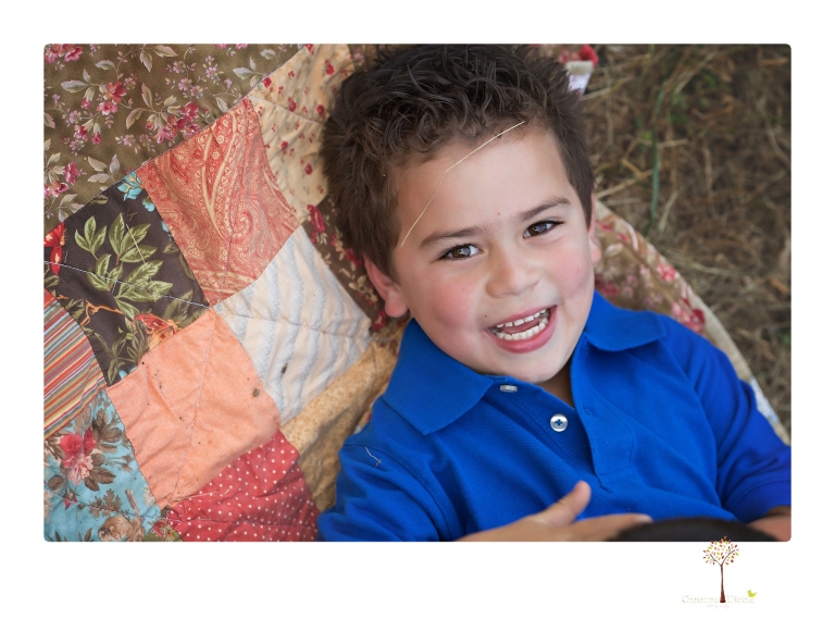 Sonora family photographer Christine Dibble Photography takes photos of a mom and her boys as they wander around Indigeny Reserve.