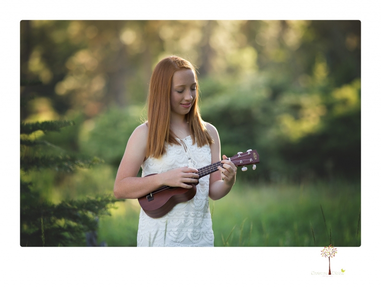 Sonora Graduation Photographer Christine Dibble Photography takes portraits of a red headed eighth grade graduate at her eighth grade graduation portrait session outside of Long Barn in fields of flowers.
