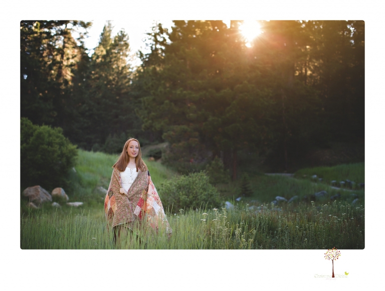 Sonora Graduation Photographer Christine Dibble Photography takes portraits of a red headed eighth grade graduate at her eighth grade graduation portrait session outside of Long Barn in fields of flowers.