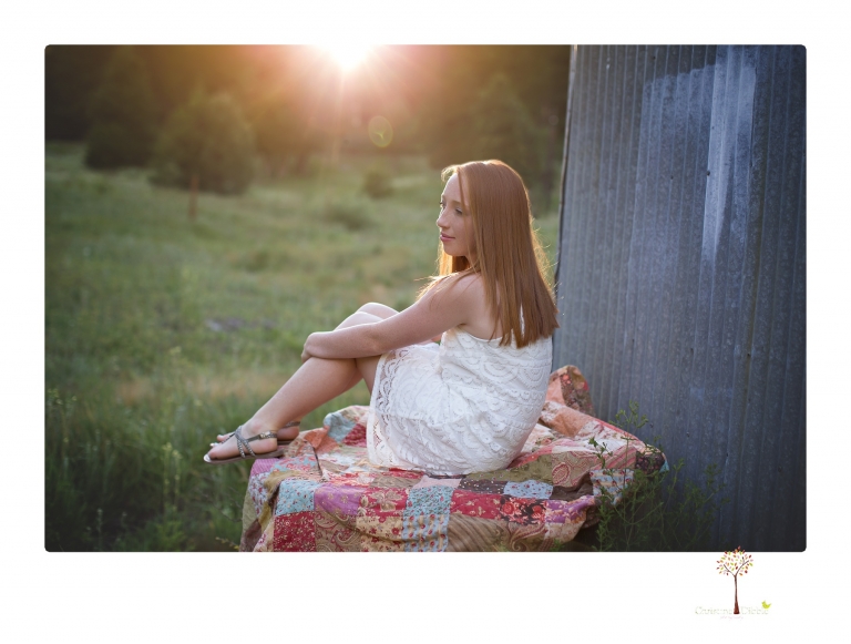 Sonora Graduation Photographer Christine Dibble Photography takes portraits of a red headed eighth grade graduate at her eighth grade graduation portrait session outside of Long Barn in fields of flowers.