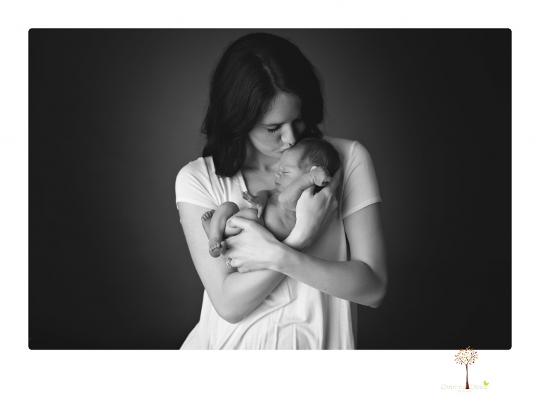 Best Sonora Newborn Photographer Christine Dibble Photography takes portraits of a newborn baby boy and his dog as well as family portraits in her Sonora studio.