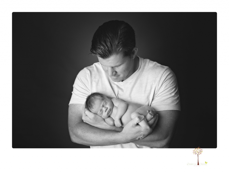 Best Sonora Newborn Photographer Christine Dibble Photography takes portraits of a newborn baby boy and his dog as well as family portraits in her Sonora studio.