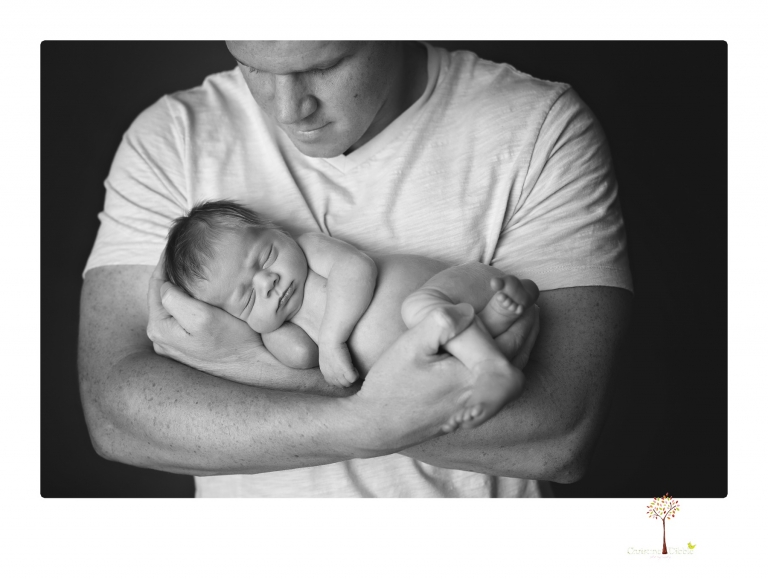 Best Sonora Newborn Photographer Christine Dibble Photography takes portraits of a newborn baby boy and his dog as well as family portraits in her Sonora studio.