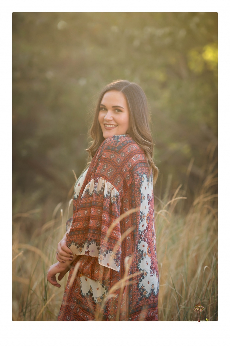 Sonora senior portrait photographer Christine Dibble Photography takes senior portraits of an Orestimba High School student at Knights Ferry in the river.