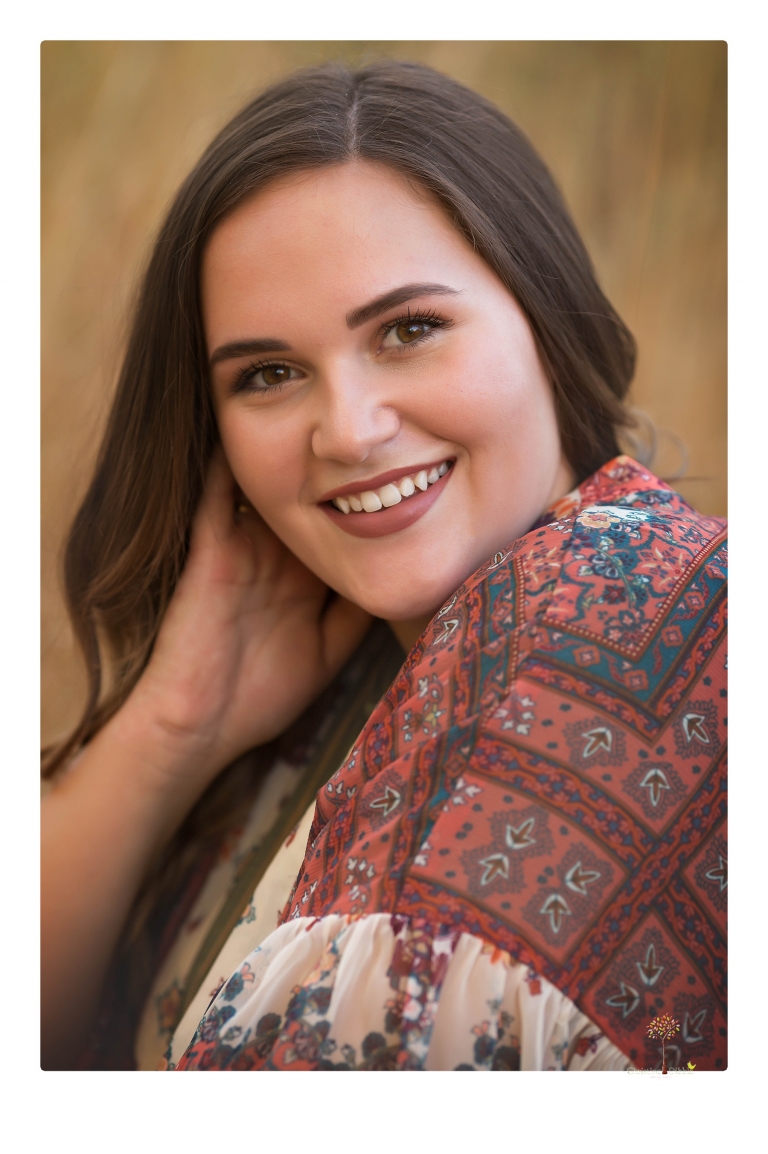 Sonora senior portrait photographer Christine Dibble Photography takes senior portraits of an Orestimba High School student at Knights Ferry in the river.