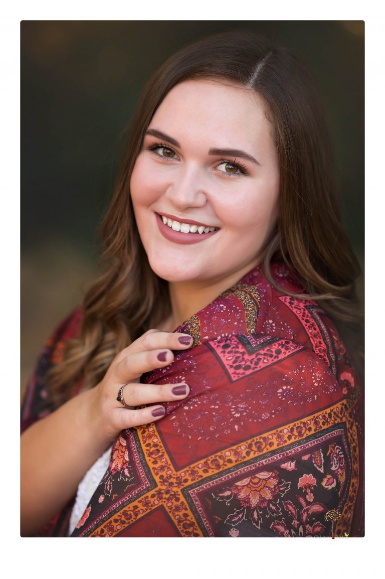 Sonora senior portrait photographer Christine Dibble Photography takes senior portraits of an Orestimba High School student at Knights Ferry in the river.