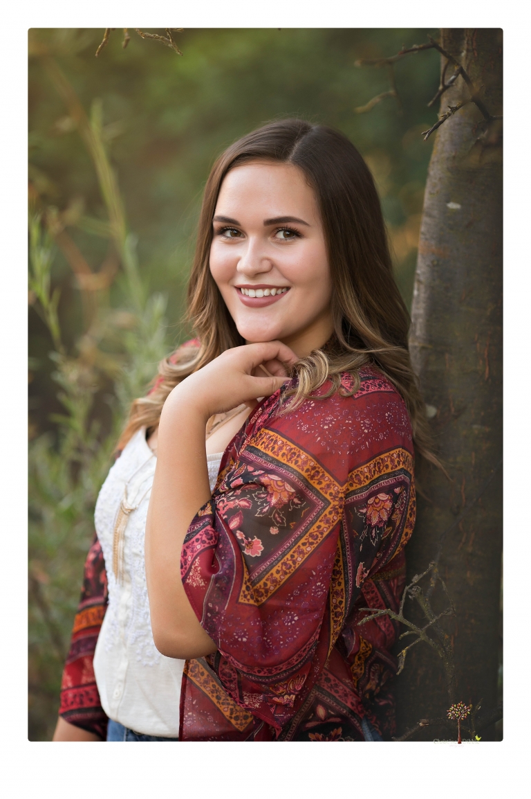 Sonora senior portrait photographer Christine Dibble Photography takes senior portraits of an Orestimba High School student at Knights Ferry in the river.