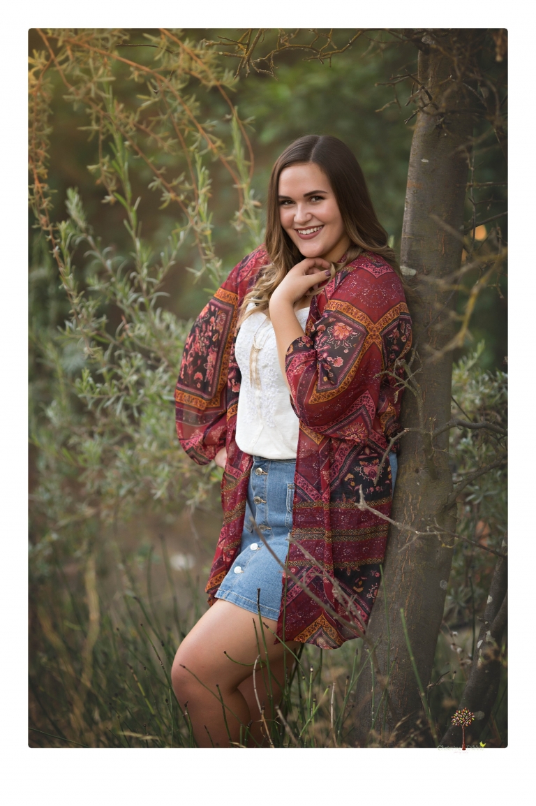 Sonora senior portrait photographer Christine Dibble Photography takes senior portraits of an Orestimba High School student at Knights Ferry in the river.