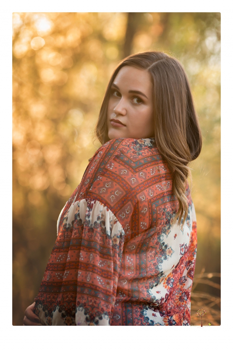Sonora senior portrait photographer Christine Dibble Photography takes senior portraits of an Orestimba High School student at Knights Ferry in the river.
