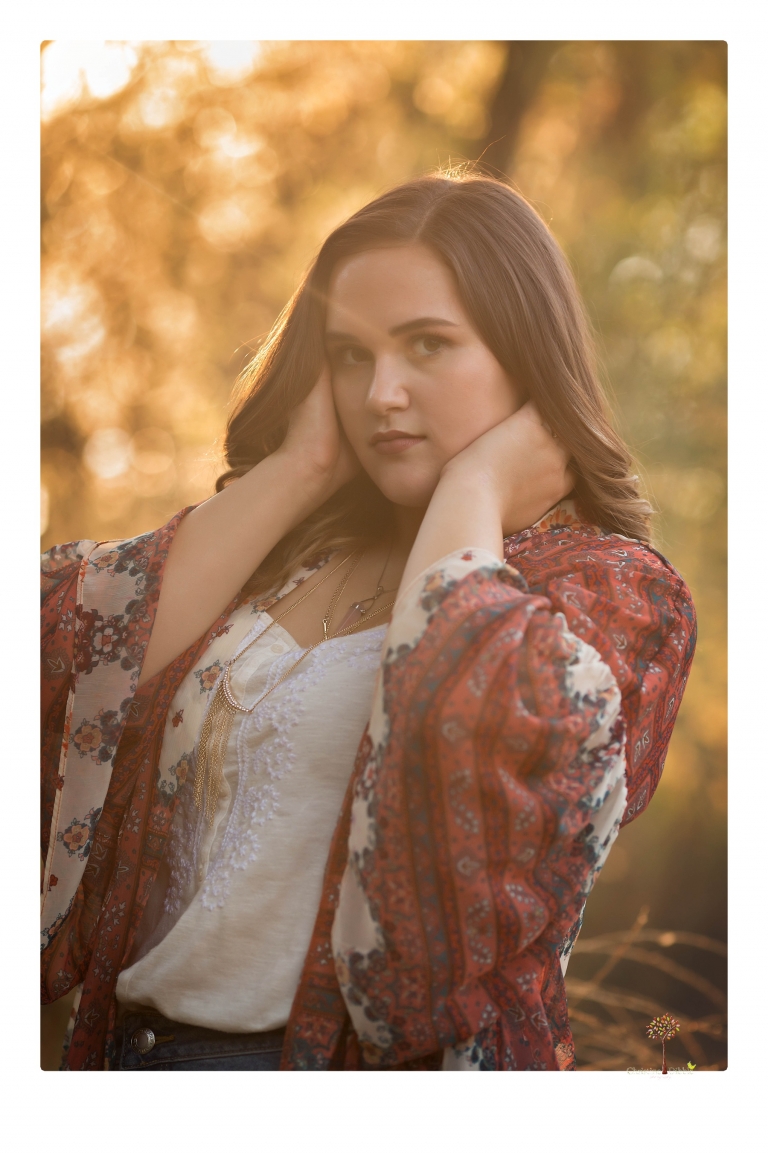 Sonora senior portrait photographer Christine Dibble Photography takes senior portraits of an Orestimba High School student at Knights Ferry in the river.