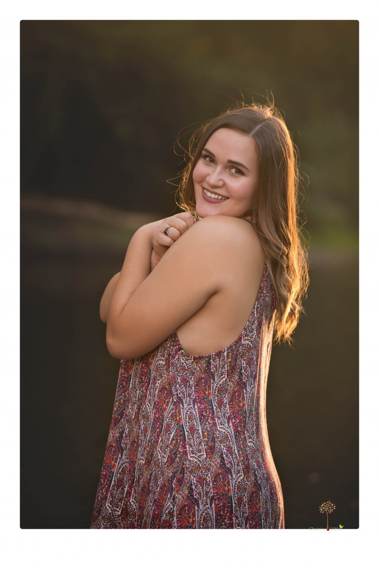 Sonora senior portrait photographer Christine Dibble Photography takes senior portraits of an Orestimba High School student at Knights Ferry in the river.