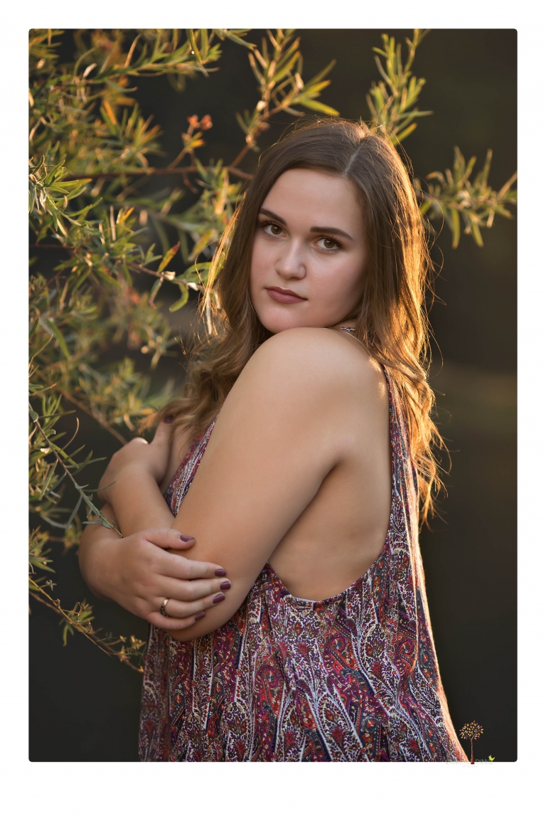 Sonora senior portrait photographer Christine Dibble Photography takes senior portraits of an Orestimba High School student at Knights Ferry in the river.