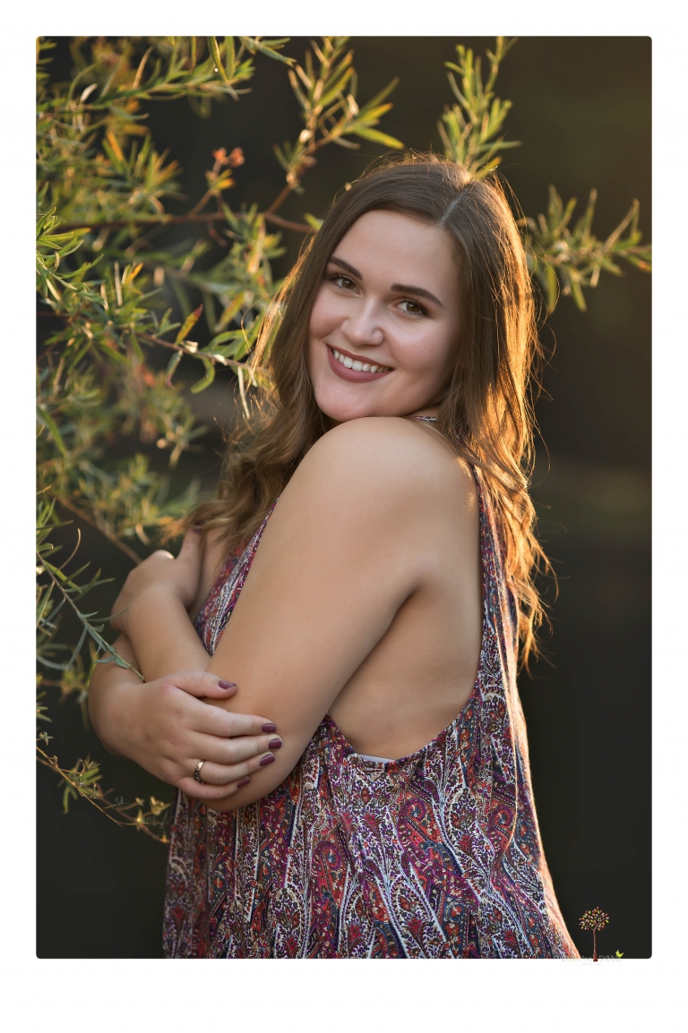 Sonora senior portrait photographer Christine Dibble Photography takes senior portraits of an Orestimba High School student at Knights Ferry in the river.