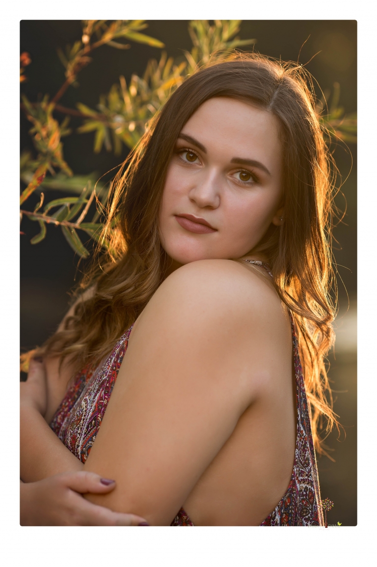 Sonora senior portrait photographer Christine Dibble Photography takes senior portraits of an Orestimba High School student at Knights Ferry in the river.