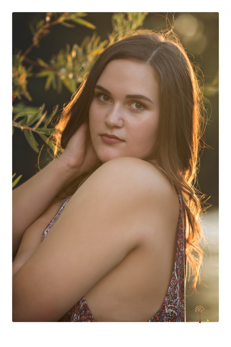 Sonora senior portrait photographer Christine Dibble Photography takes senior portraits of an Orestimba High School student at Knights Ferry in the river.